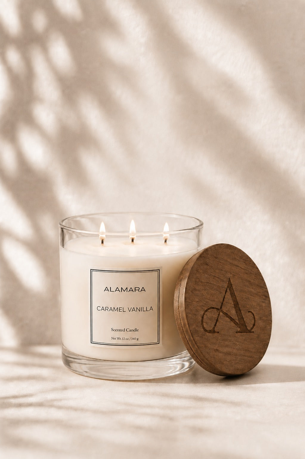 Candle with wooden lid on a neutral background