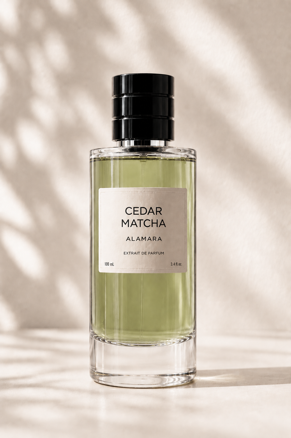 Perfume bottle labeled 'Cedar Matcha' by Alamara on a neutral background