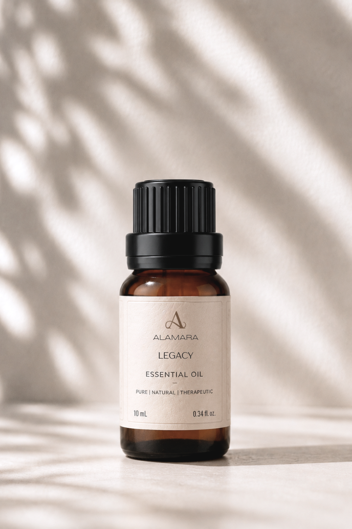 Alamara Legacy essential oil bottle on a light background with shadows