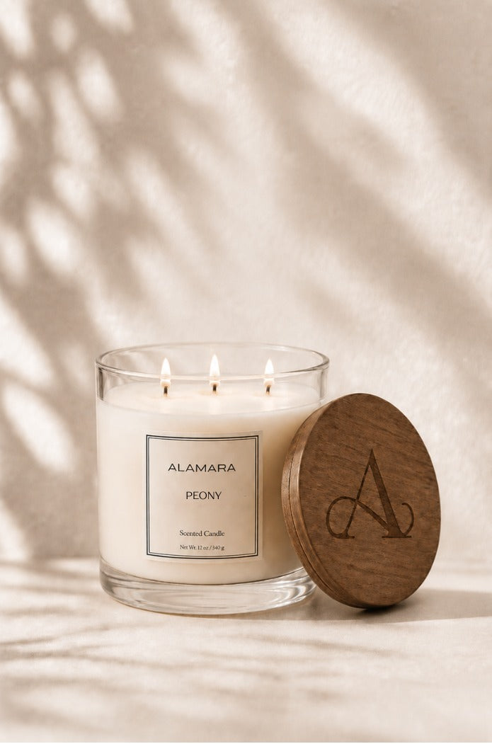 Glass candle with wooden lid on a neutral background