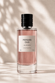 Perfume bottle labeled 'Persian Oud' by Alamara on a neutral background