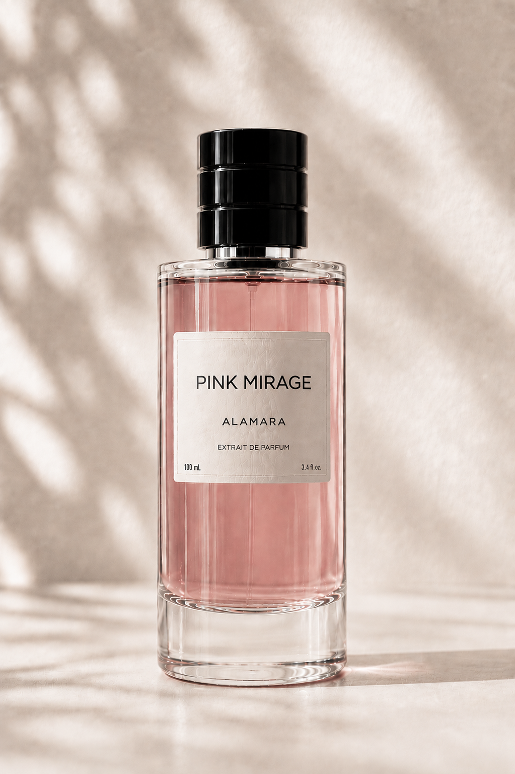 Perfume bottle labeled 'Pink Mirage' by Alamara on a neutral background