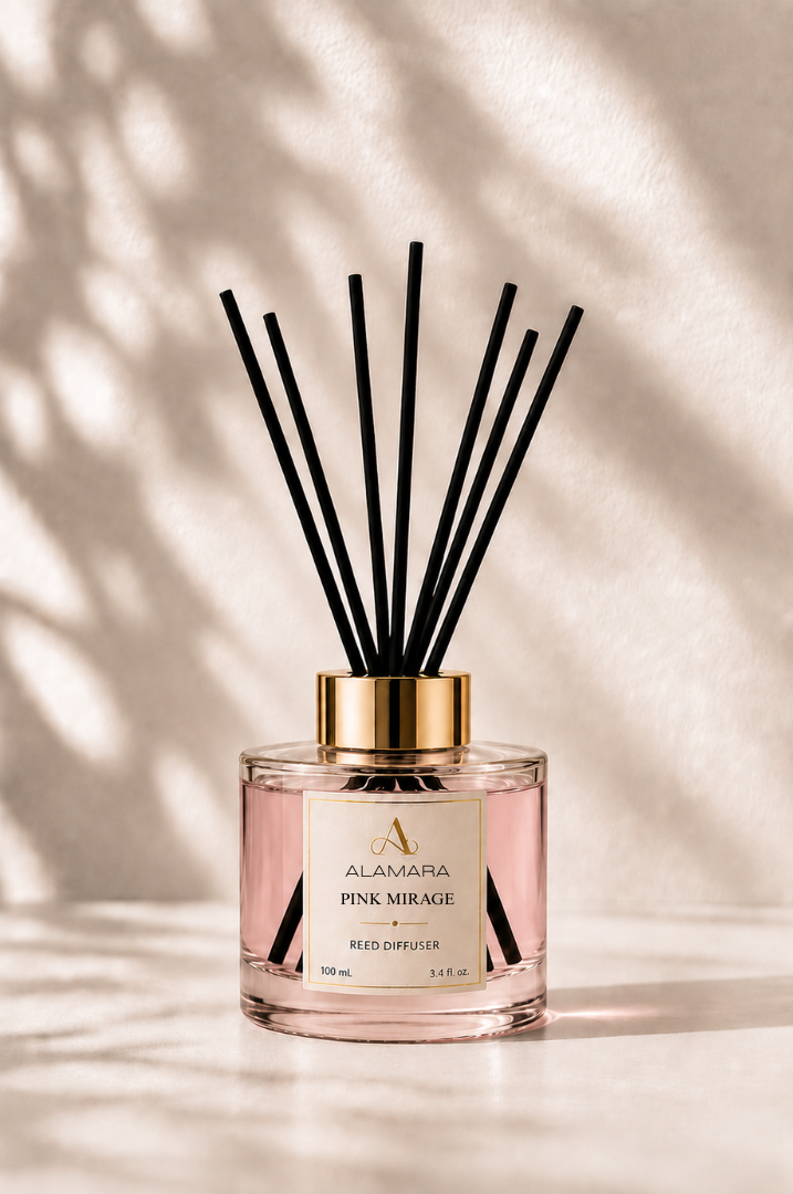 Reed diffuser with black sticks on a light background